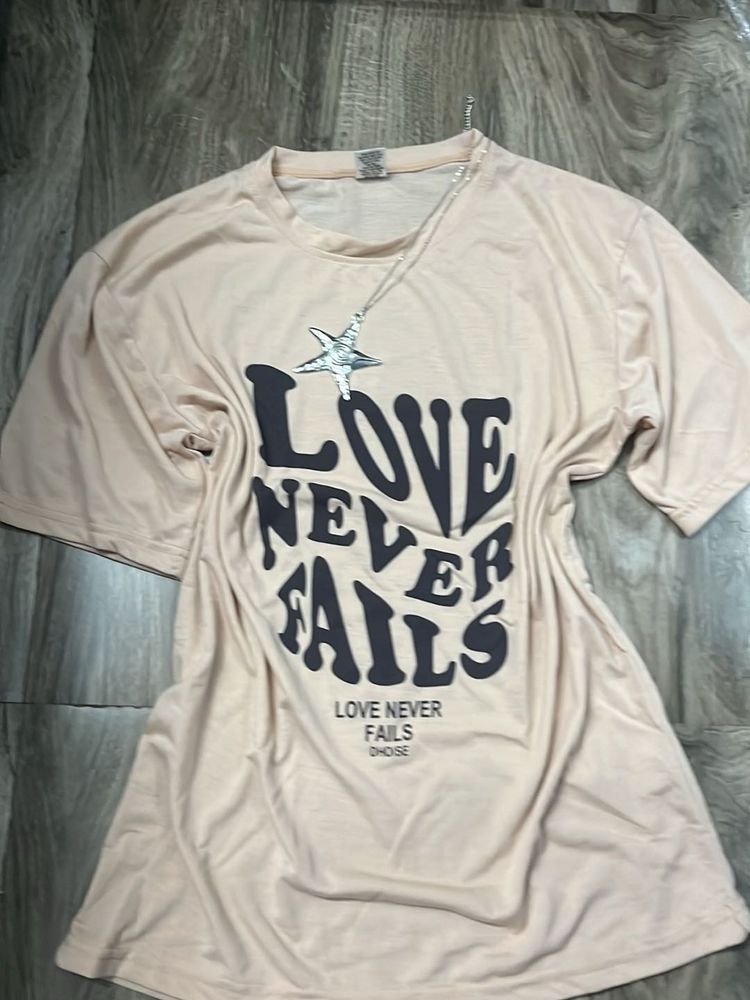 Love Never Fails Graphic Tee