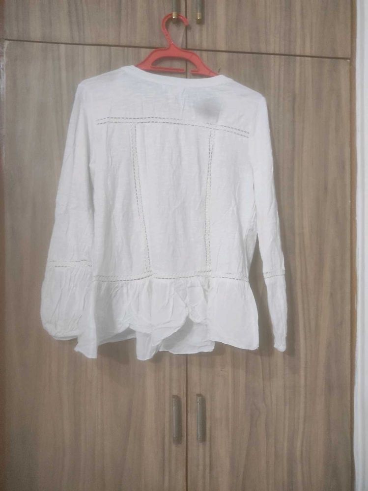 White Peplum Top