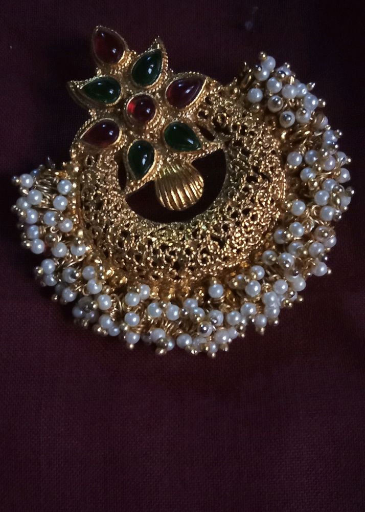 Rich Gold Jewellery Set Of One Detailed Worked Pendent With Two Royal Earings Completes Your Saree Look Perfectly