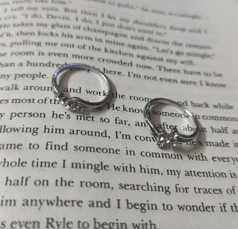 Silver diamond rings.