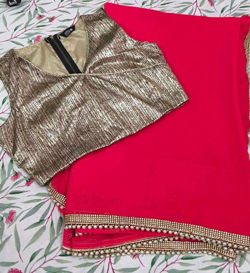 Pink Saree with Golden Blouse