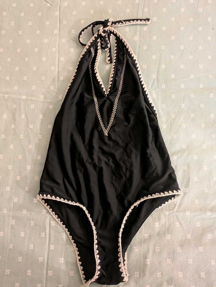Black halter swimsuit w/crochet detail