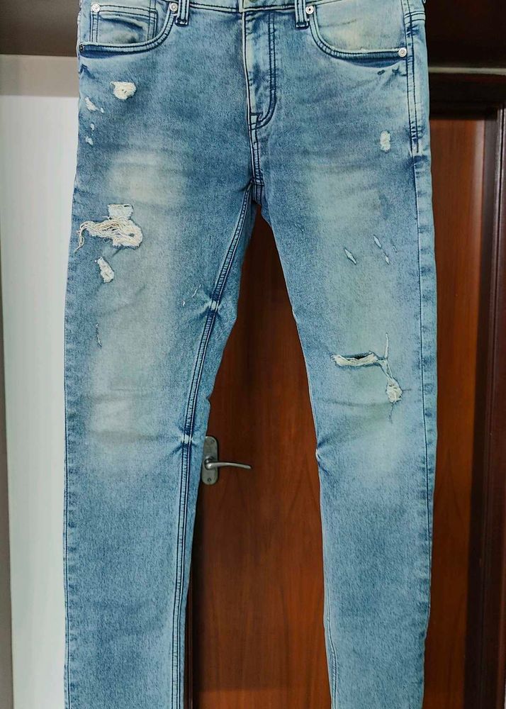 Distressed Denim Jeans