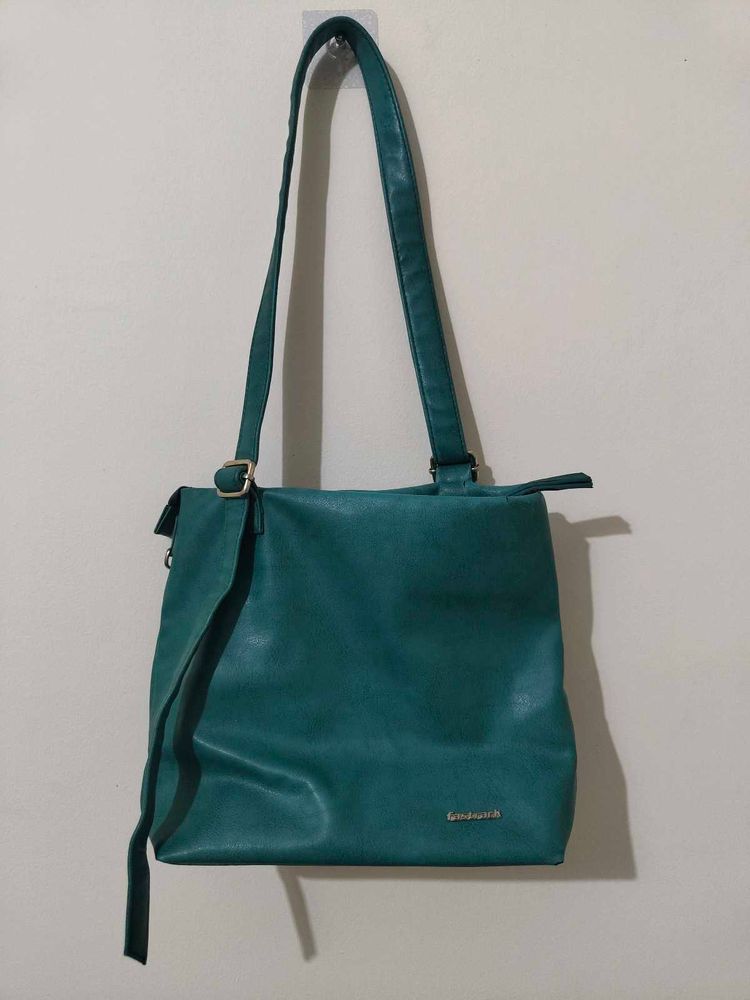 Fastrack Teal Sling Bag – Used, Good Condition