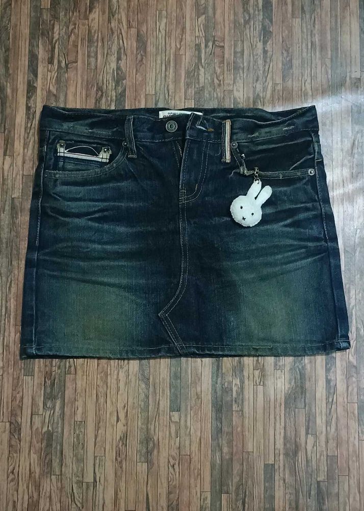 Dark wash denim mini skirt