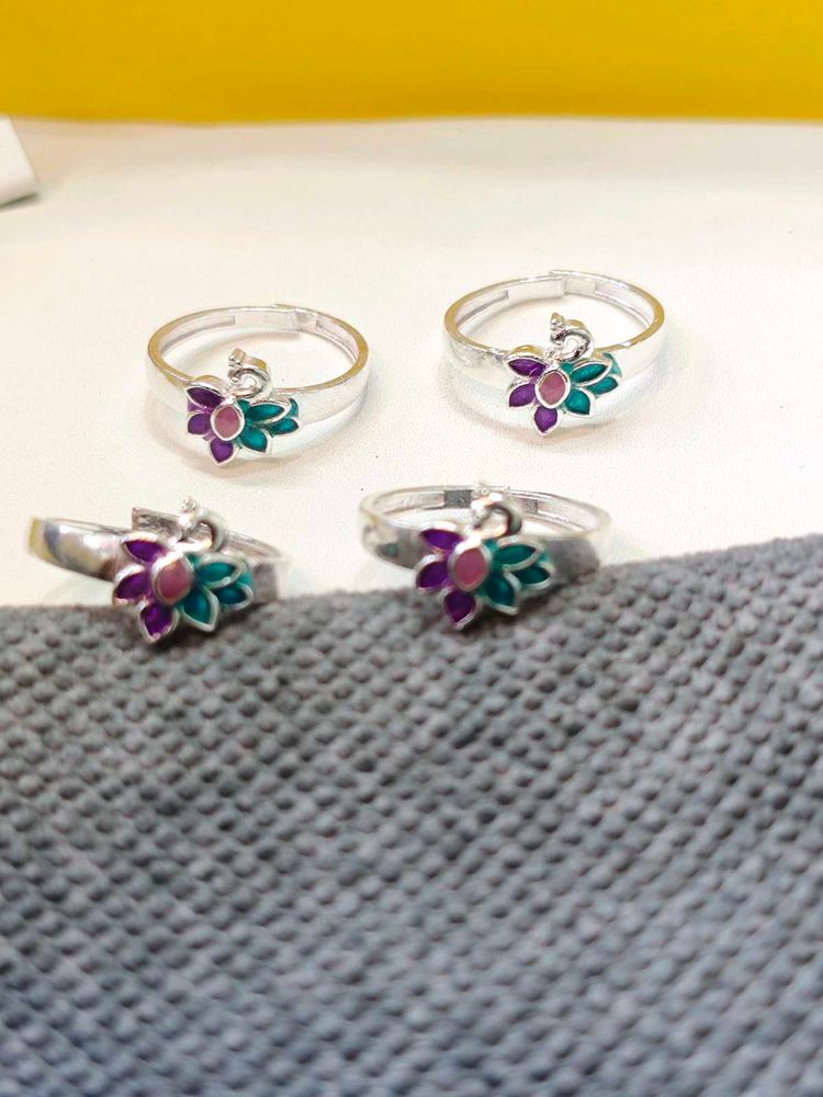 Pure silver toe ring in peacock design.