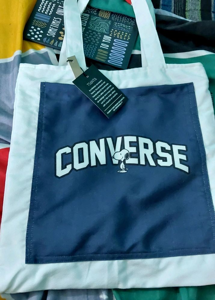 ITS A CONVERSE TOTE BAG. NOT USED EVEN ONCE. NEWLY MANUFACTURED WITH TAG. Tote Bag Contains One Big Blue  Pocket Outside The Bag.