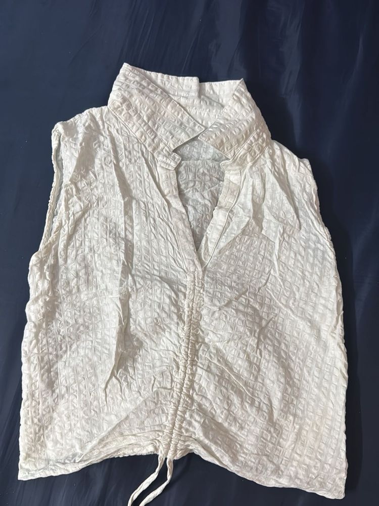 White Sleeveless Top