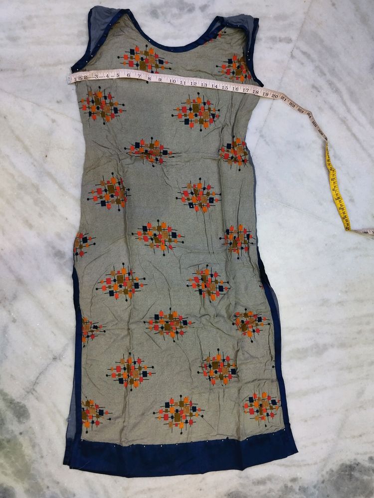 A Grey Sleeveless Kurti