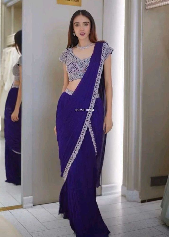 Elegant Blue Saree with Silver Embellishments