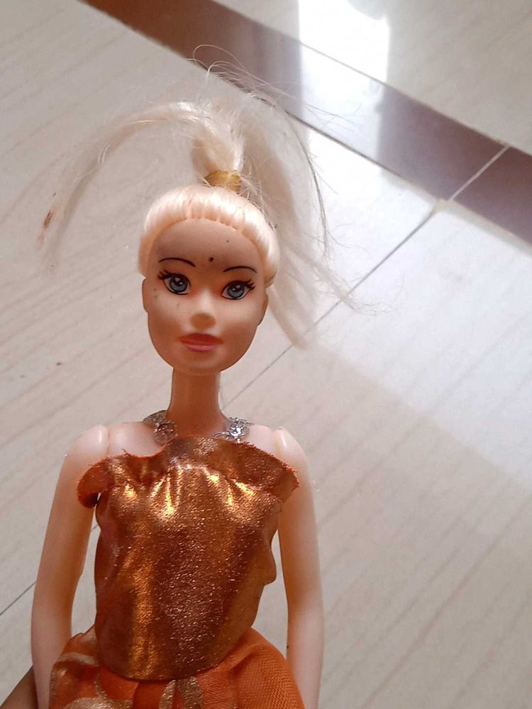 Barbie Doll in Orange Dress