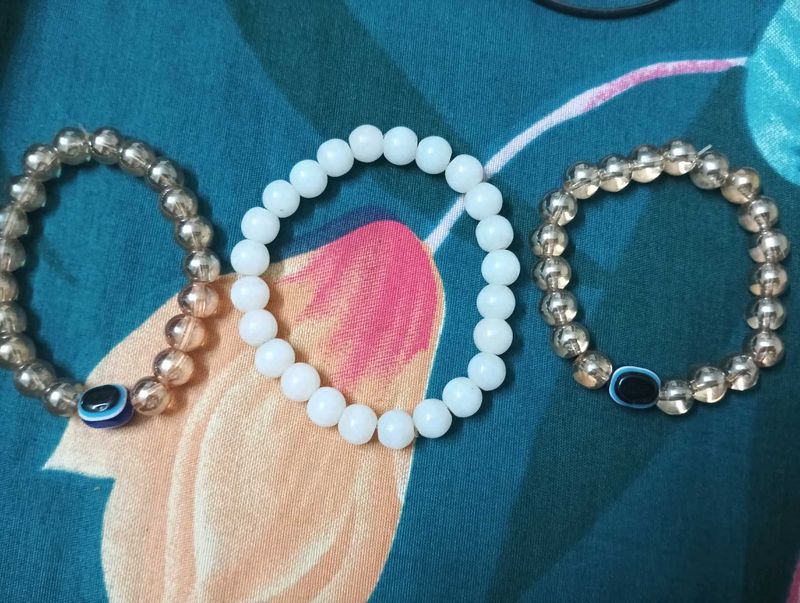 Stack Of 3 Bracelets, 2 Evil Eyes And 1 White