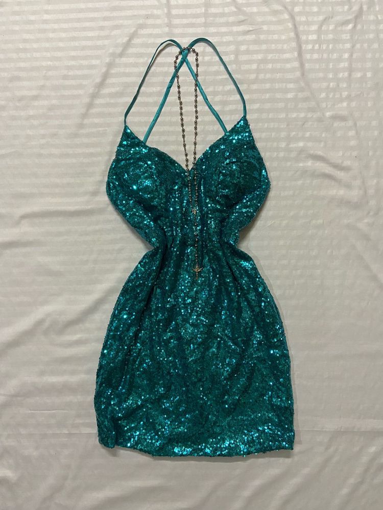 green sequined dress
