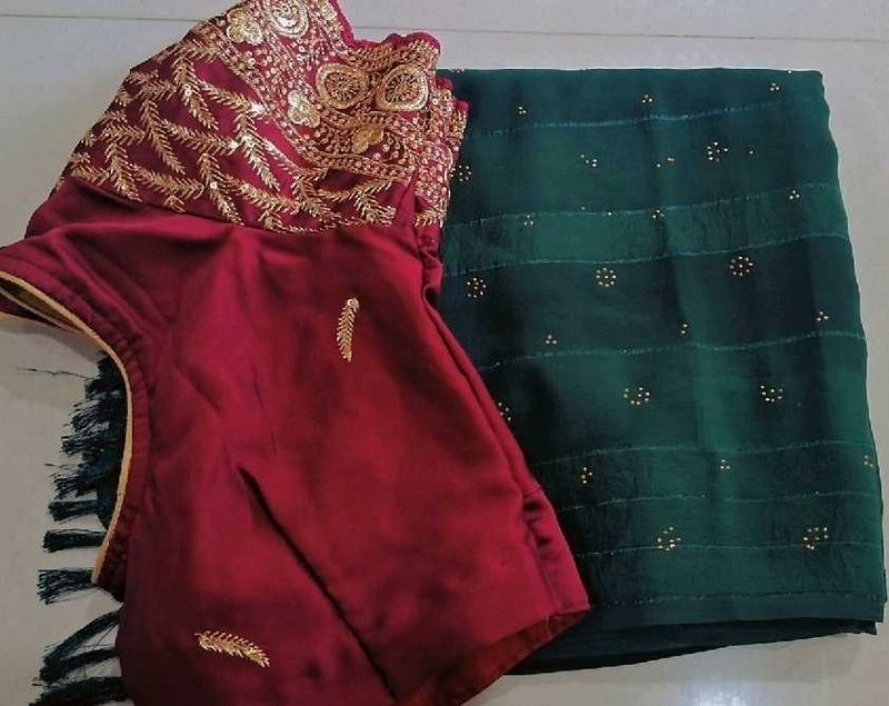Elegant green saree with designer blouse
