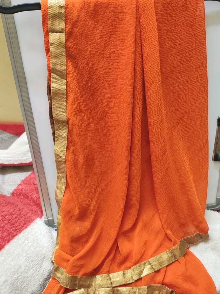 Orange Dupatta with golden lace