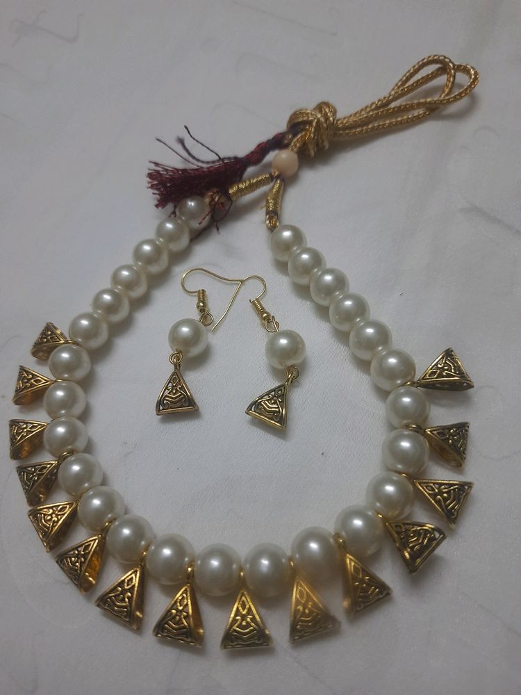 New necklace with earrings , stock clearance sale