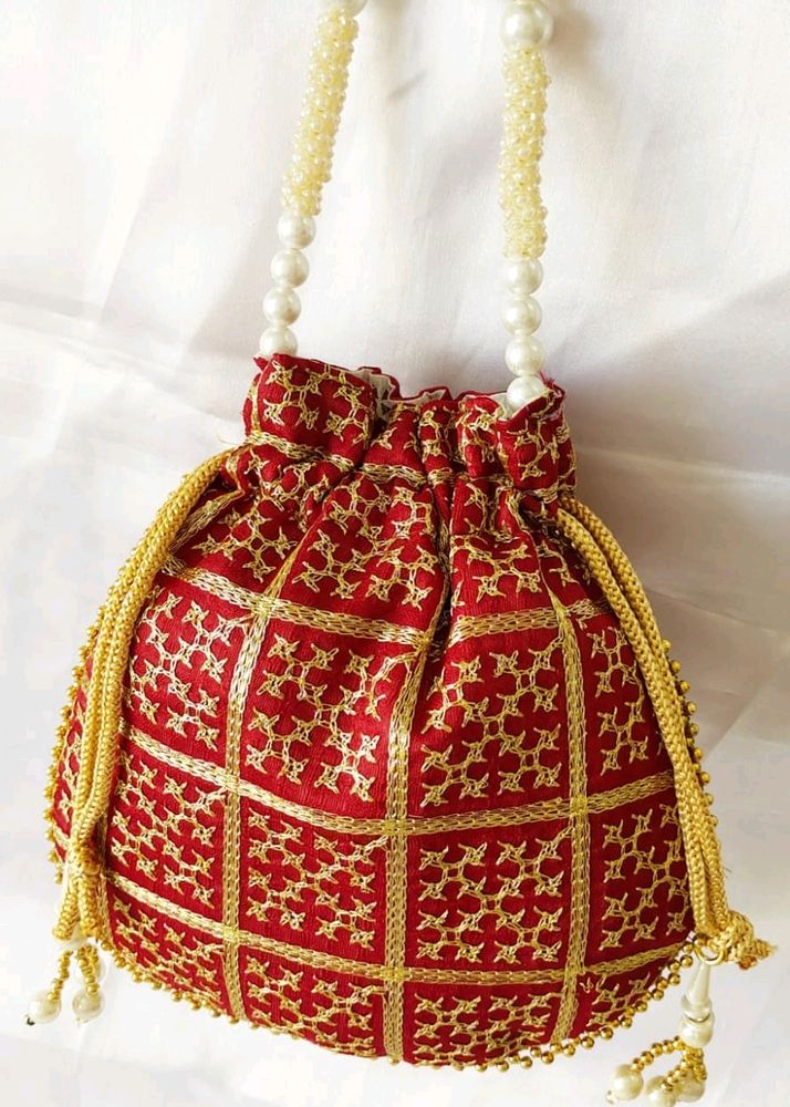 Maroon Beautiful Zari Embroidery Potli Bag