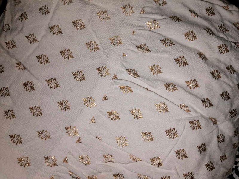 White Skirt With Golden Print