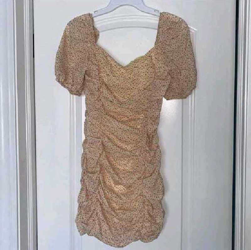 nude floral ruched mini dress with puff sleeves