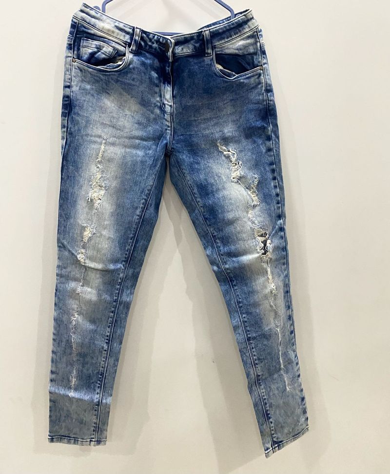 Ripped Blue Denim Jeans