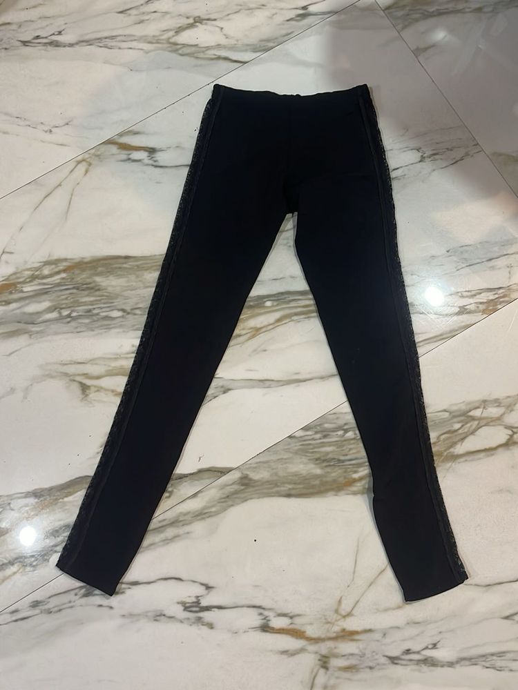 Black Leggings ( With Lace Work On Both Sides)