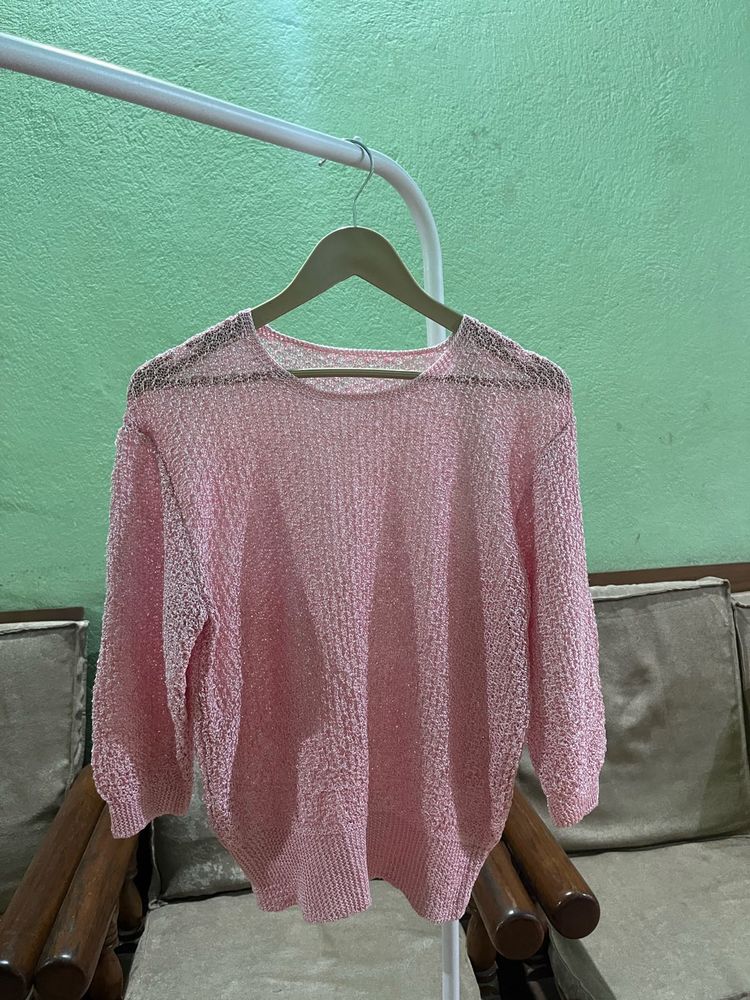 pink open-knit sweater
