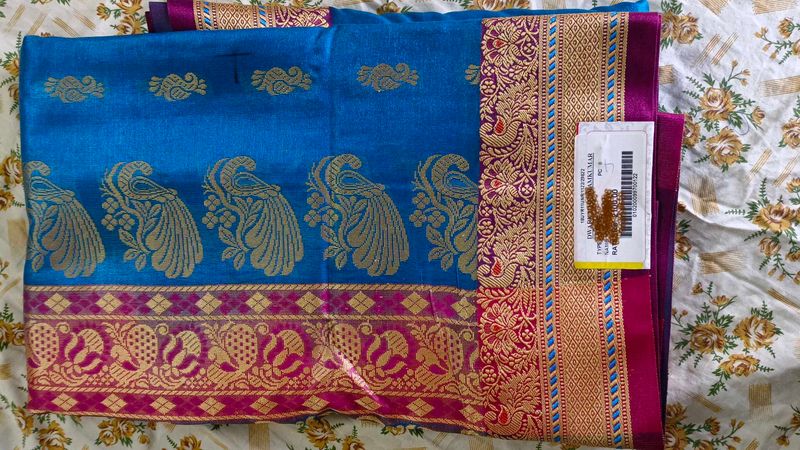 Blue Silk Saree with Peacock Design