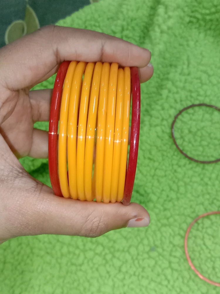 combo of glass and metal bangles