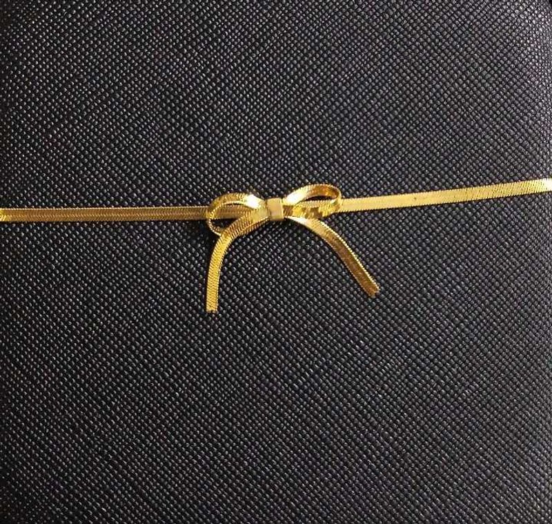 Snake Chain Bow Pendent