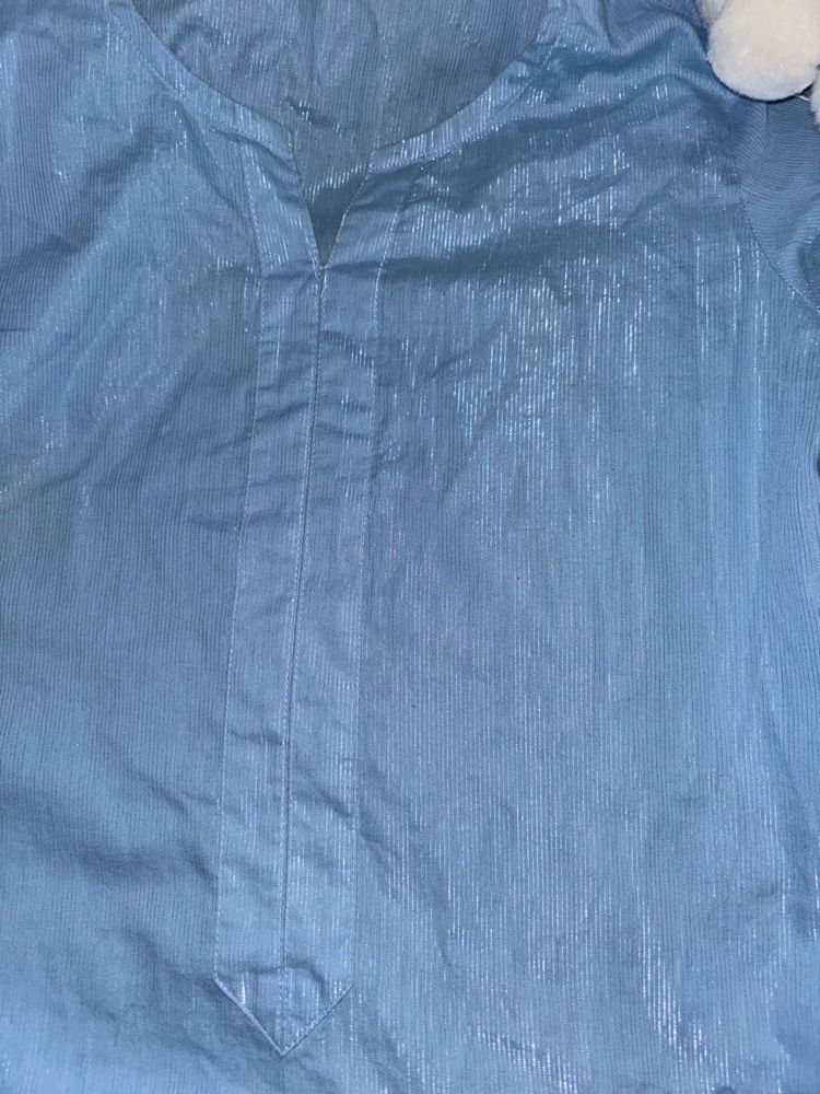 Blue Kurti With Silver Threads On It