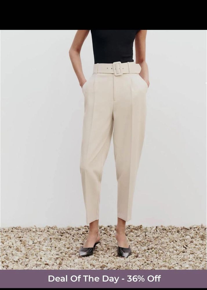 Beige belted trousers