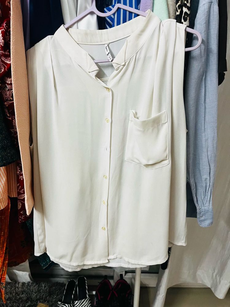 Sleeveless Button-Up Blouse