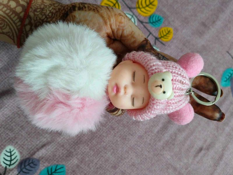 combo of cute doll keychain , bracel
