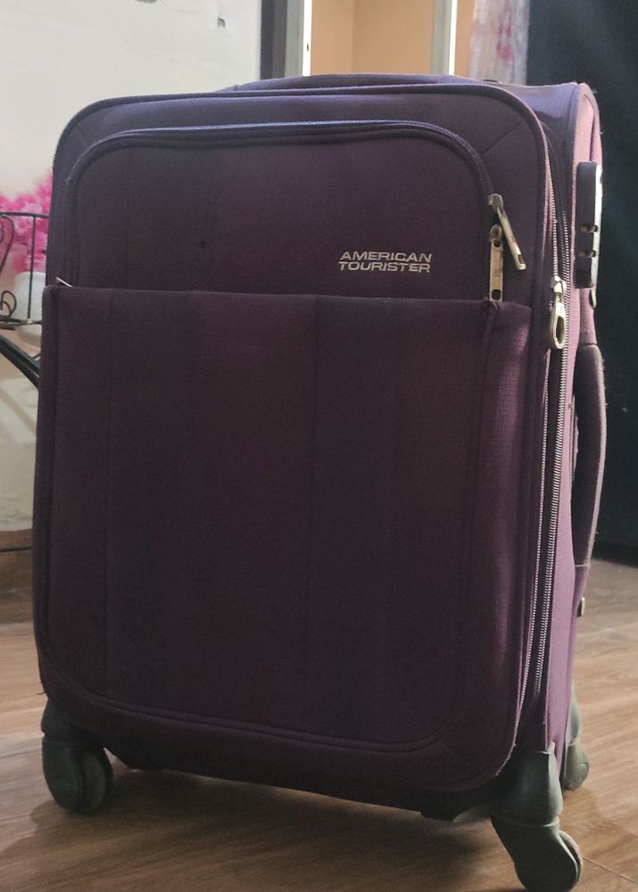 American Tourister Purple Medium Trolley Suitcase