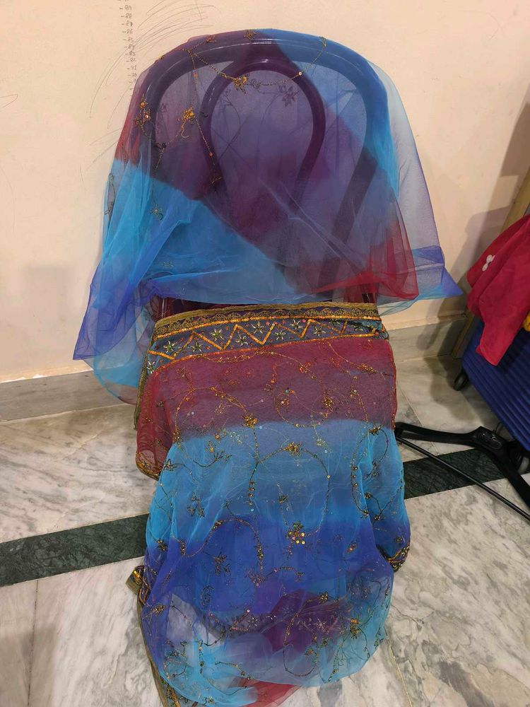 Red, blue and purple blend net saree