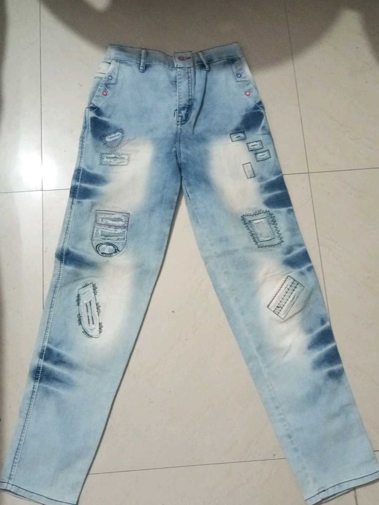Distressed Patchwork Denim Jeans