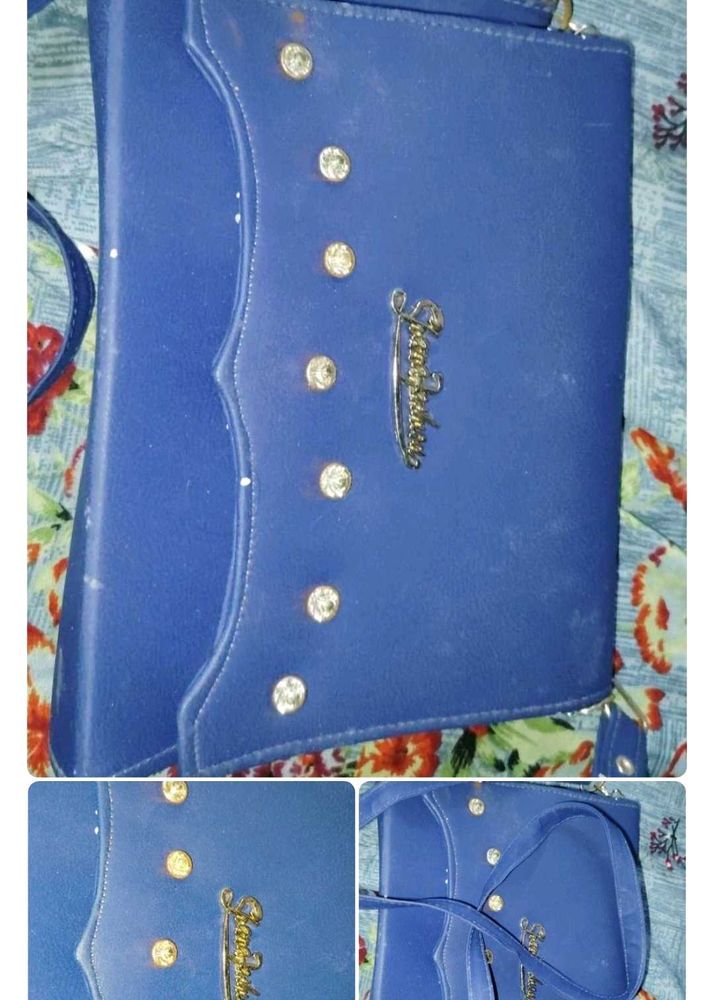 Blue Silling Bag With Matching Earrings.