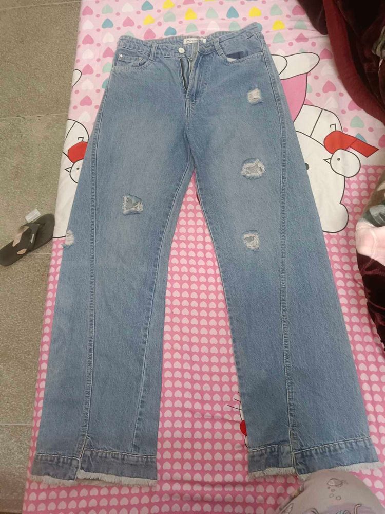 Distressed Light Wash Denim Jeans