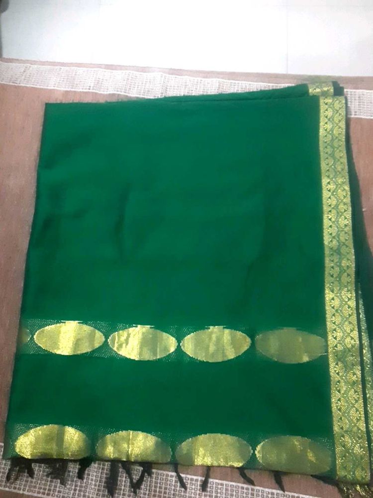 Elegant Green Saree with Gold Border