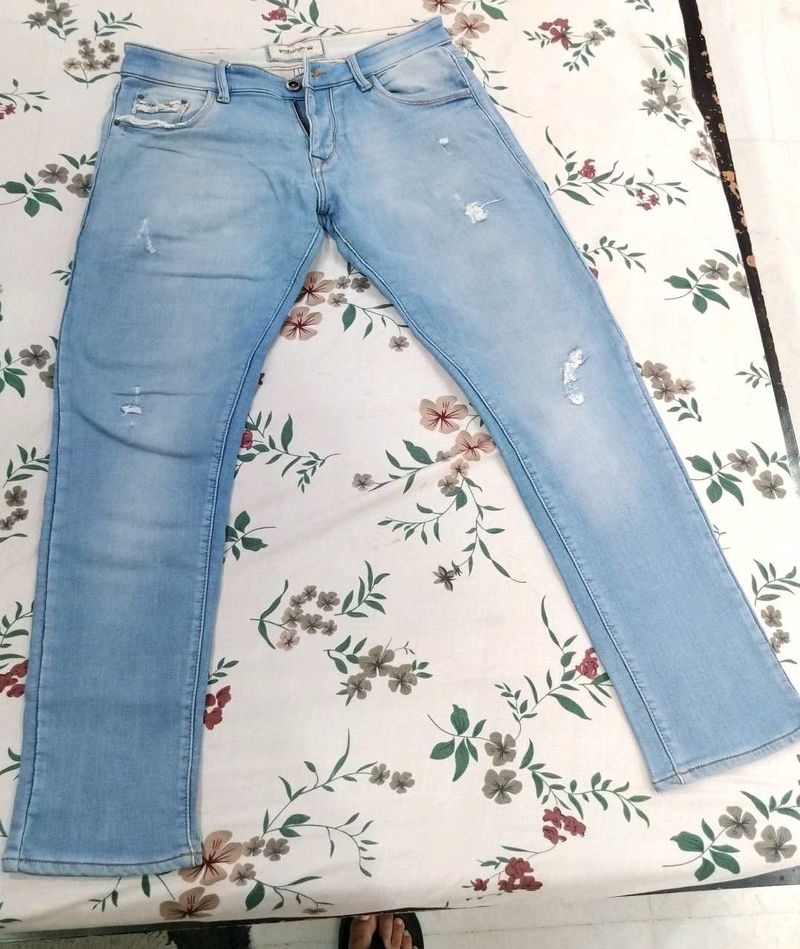Light Wash Distressed Jeans