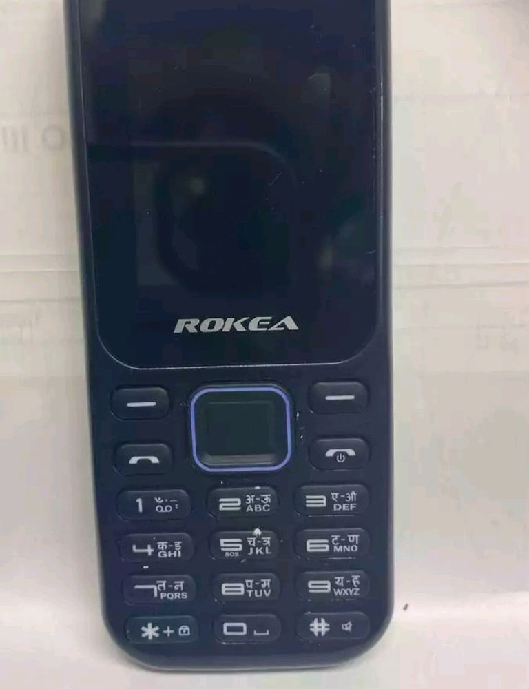 Rokea R310 New Mobile Phone Box Packing With Chrgr