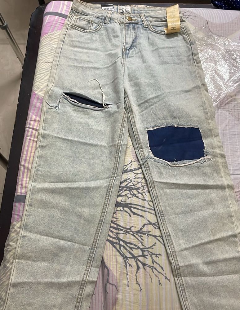 Ripped Jeans - Light Wash Denim