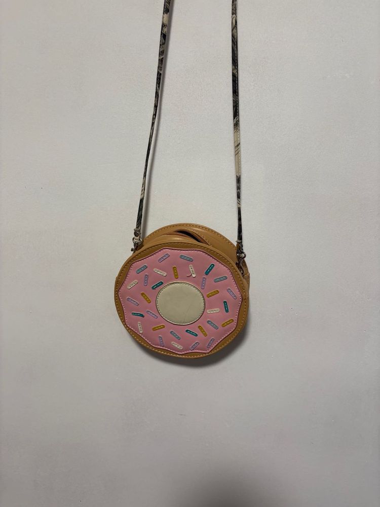 Donut shaped cross body bag