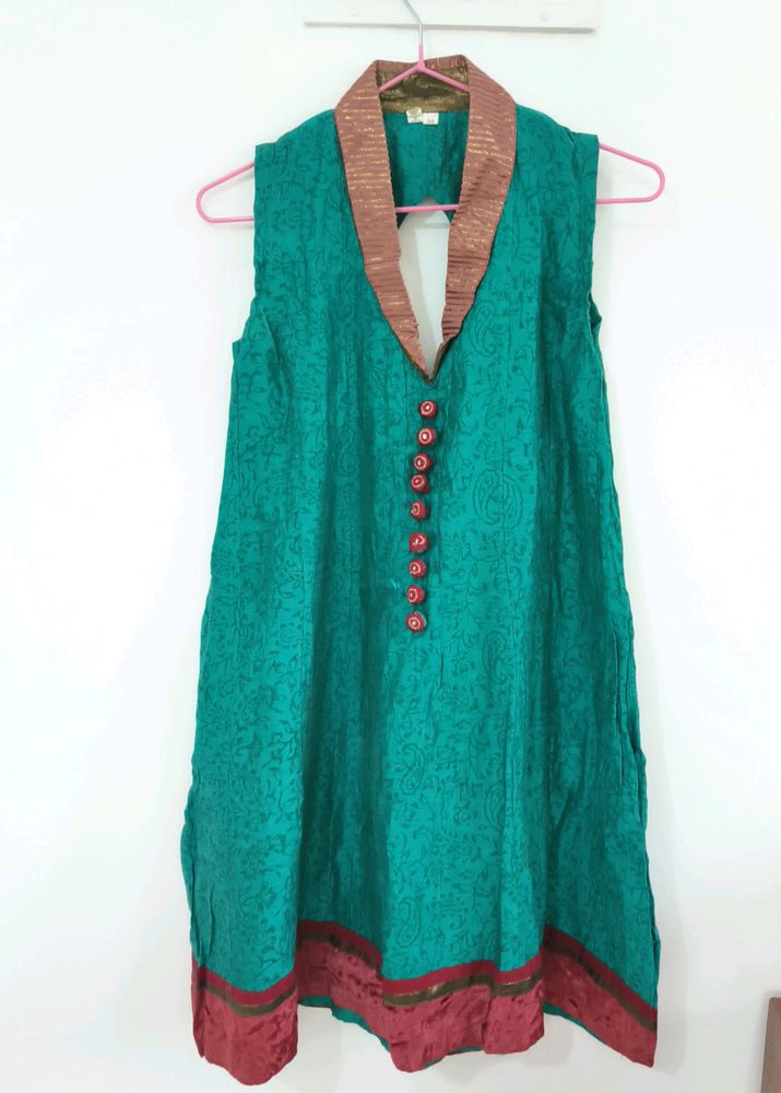 Collar neck Turquoise Kurta With Red Velvet Border