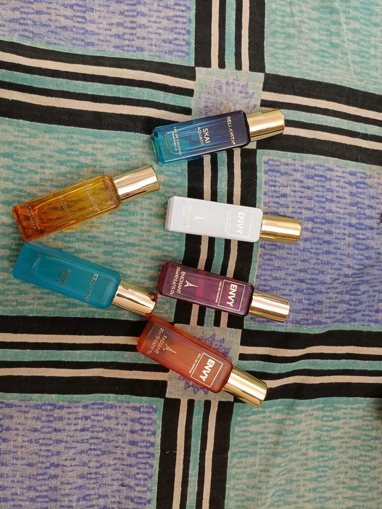7 Bottles Of Perfume Set.....