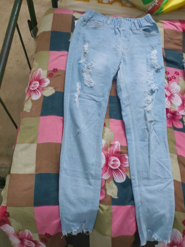 Ripped Light Blue Jeans