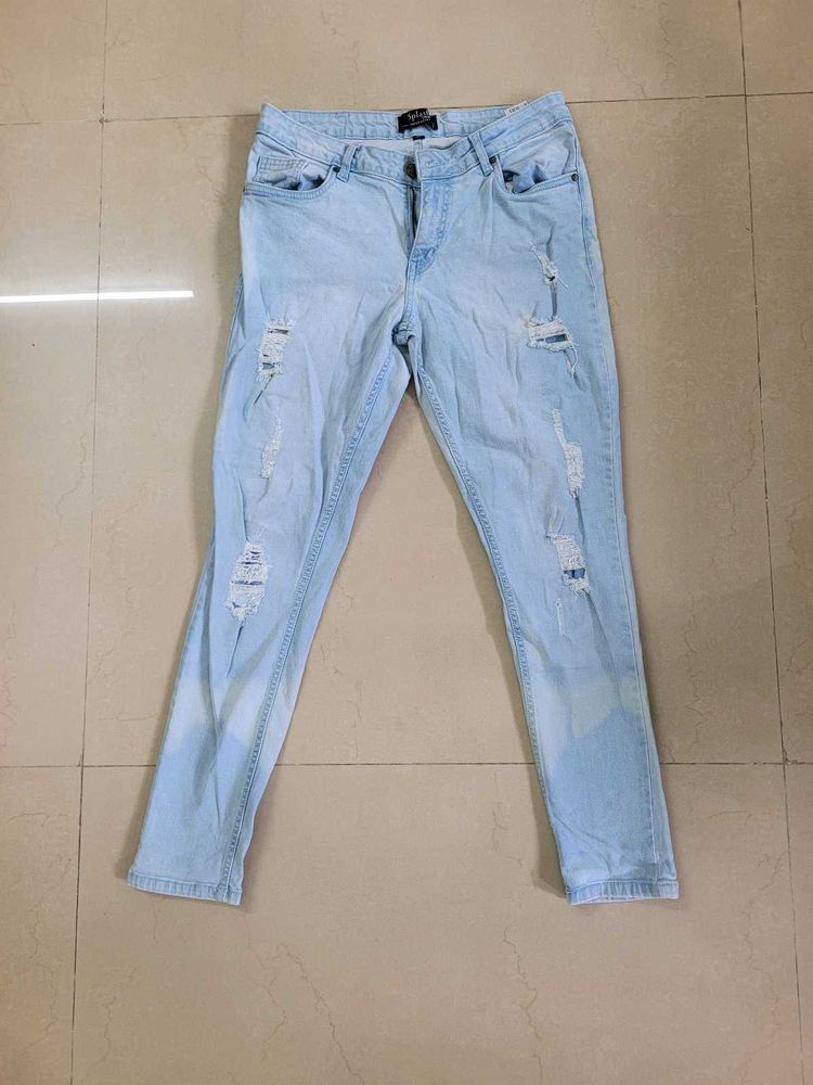 Ripped Light Wash Blue Jeans
