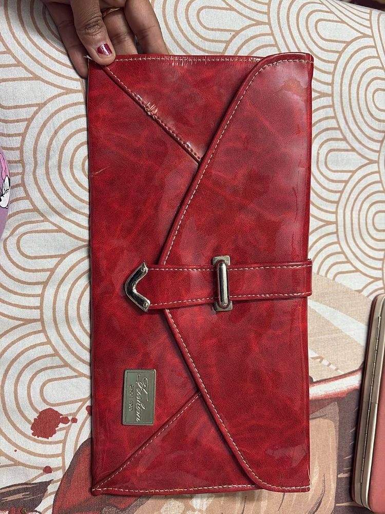 Women red clutch