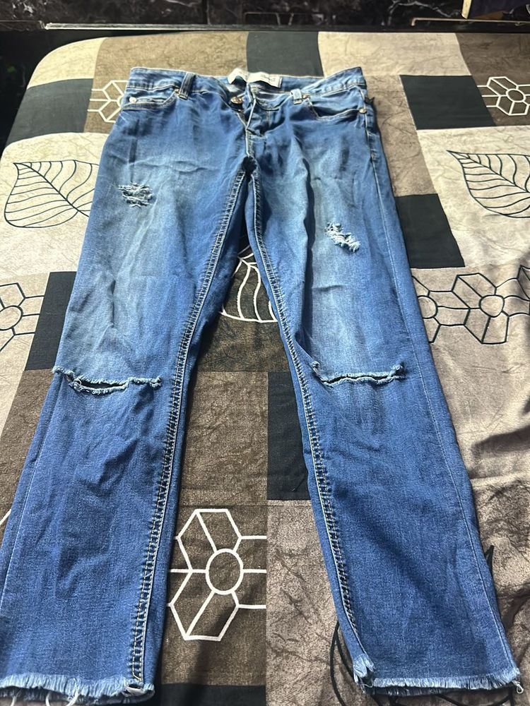 Distressed Denim Jeans