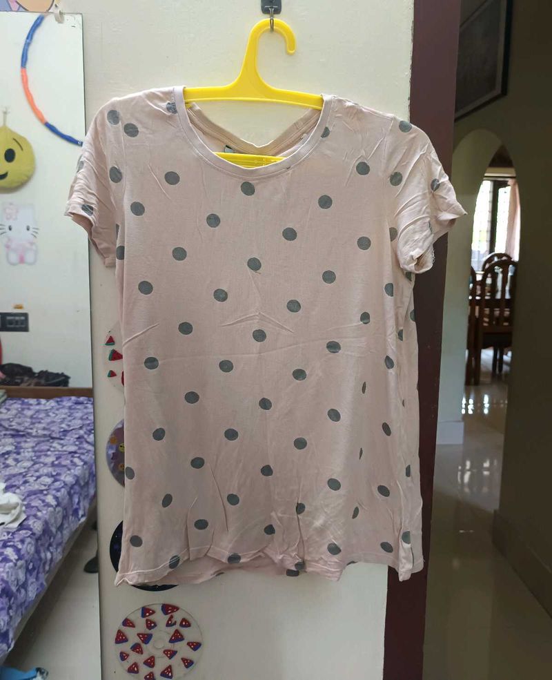 Nude color tshirt with sliver patch work.